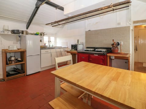 Fridge, electric kettle, cookware/dishes/utensils