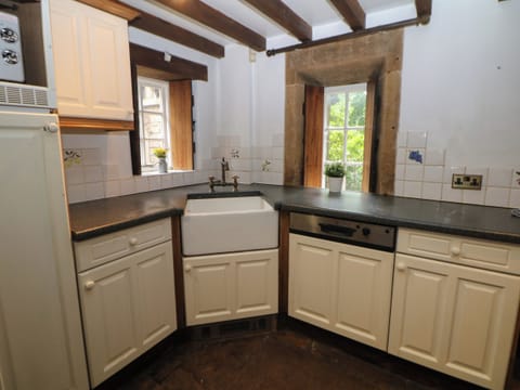 Fridge, electric kettle, cookware/dishes/utensils