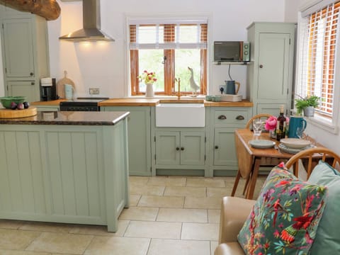 Fridge, electric kettle, toaster, cookware/dishes/utensils