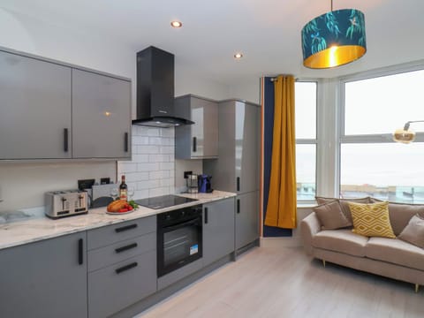 Fridge, electric kettle, toaster, cookware/dishes/utensils