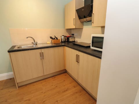 Fridge, electric kettle, toaster, cookware/dishes/utensils