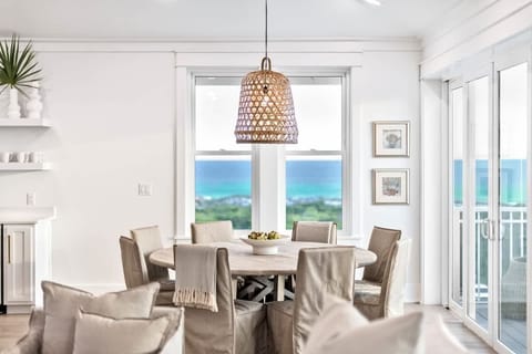 Bright and airy dining space with panoramic ocean views