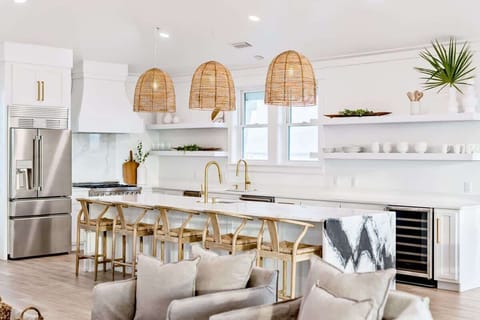 Open-concept living room with seamless flow to the kitchen and dining areas.