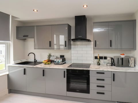 Fridge, electric kettle, toaster, cookware/dishes/utensils