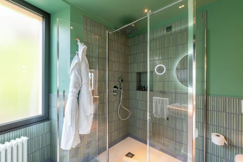 Junior Suite, Terrace, Lake View | Bathroom | Shower, hair dryer, slippers, towels