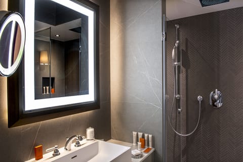 Superior Room | Bathroom | Rainfall showerhead, designer toiletries, hair dryer, bathrobes