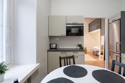 The kitchen is fully equipped including cooking utensils and crockery