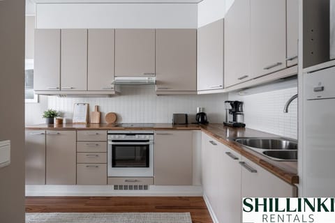 The kitchen is fully equipped with cooking utensils, crockery, oven, stove, microwave, fridge, etc.