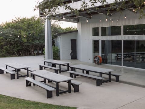 Stellar House's huge back (partially) covered patio perfect for events and gatherings