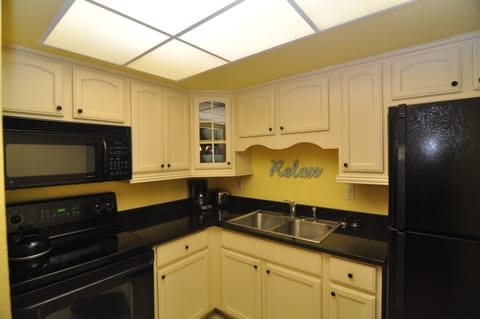 Two-Bedroom Condo - No Resort or Parking fees | Private kitchen | Microwave, coffee/tea maker