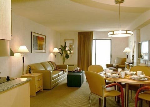 Suite, 1 King Bed and Queen Sofa Bed (Serenity Suite) | Living area | Flat-screen TV, DVD player