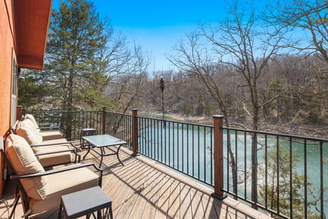 Welcome to our spacious lakeside retreat on Beaver Lake! Located on the shoreline, this epic property offers an unforgettable getaway experience.