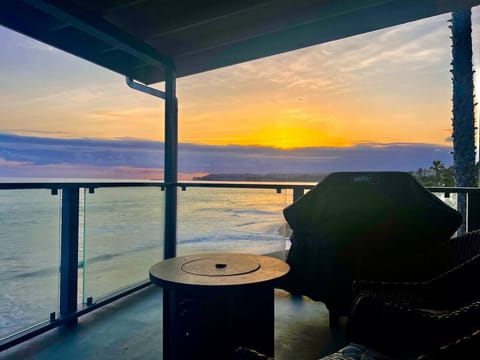 Upstairs deck w/ bbq, fire pit, table & 4 chairs, 2 chairs