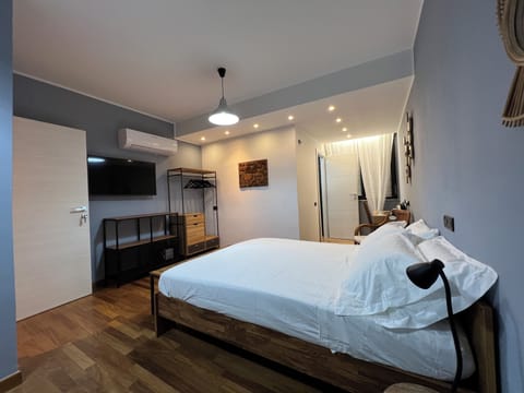 Luxury Studio Suite, Balcony, Park View | In-room safe, desk, laptop workspace, free WiFi