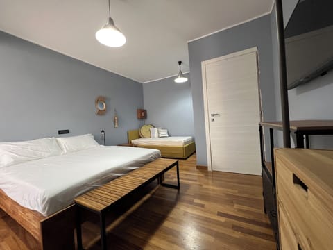 Luxury Studio Suite, Balcony, Park View | In-room safe, desk, laptop workspace, free WiFi