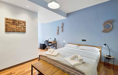 Luxury Studio Suite, Balcony, Park View | In-room safe, desk, laptop workspace, free WiFi