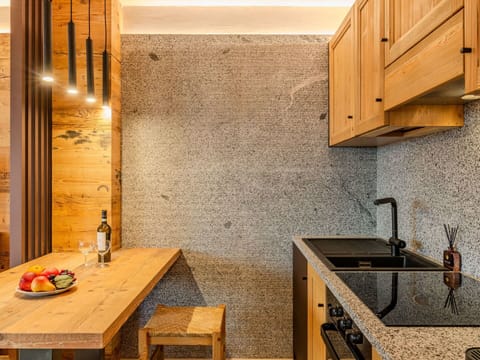 Countertop, Wood, Kitchen, Flooring, Interior Design, Floor, Ceiling, Cabinetry, Plumbing Fixture, Tap