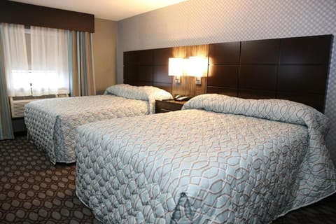 Deluxe Room, 2 Queen Beds | Premium bedding, desk, iron/ironing board, free WiFi