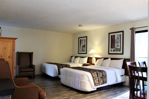 Deluxe Queen Room with Two Queen beds, Kitchen and Fireplace | In-room safe, iron/ironing board, free WiFi, bed sheets