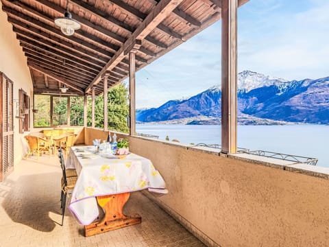 Flooring, Interior Design, Floor, Apartment, Balcony, Ceiling, Condominium, Chair, Shade, Porch