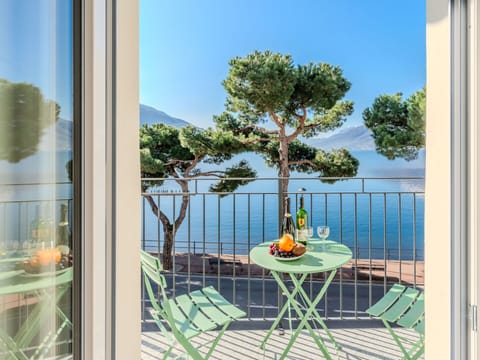 Flooring, Interior Design, Floor, Apartment, Balcony, Ceiling, Condominium, Chair, Shade, Porch