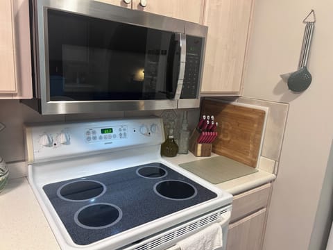 Electric glass topped stove, built in microwave