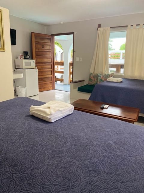 Queen Room with Pool view | In-room safe, desk, free WiFi, bed sheets