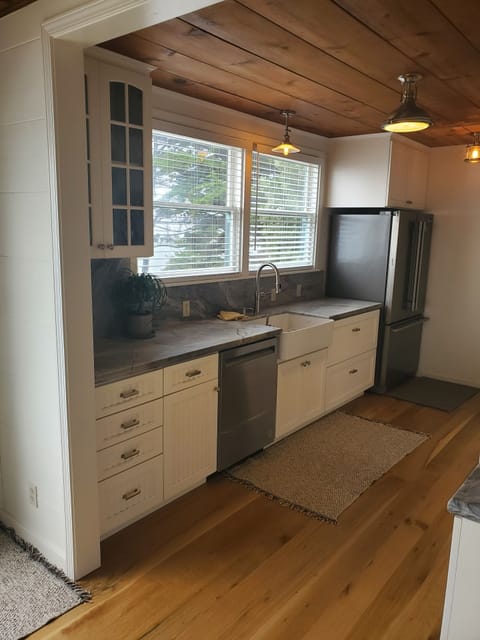Modern Kitchen with fridge, dishwasher, disposer, dual fuel range, ocean views