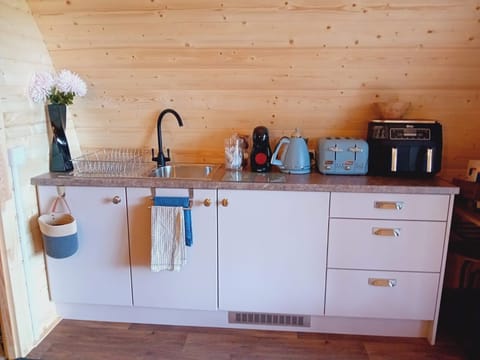 The Pod kitchen is equipped with a dual tub Ninja Air Fryer, Dolce Gusto Coffee Maker, Toaster and Kettle, ample storage and a built in fridge-freezer. Coffee pods and lots more provided to ensure convenience.