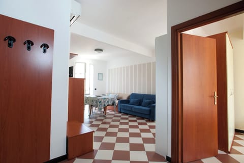 Standard Apartment, 1 Bedroom (6pax) | Living room | Flat-screen TV