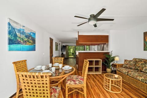Dining room flows seamlessly into the kitchen and living room, creating an open and inviting space.
