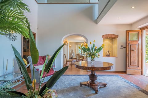 Deluxe Villa, Patio, Hill View | Living area | 32-inch flat-screen TV with cable channels