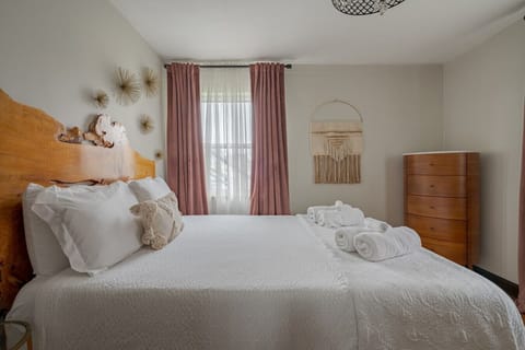 There is a soft ambient light that we installed behind the headboard. It`s a perfect reading before bed!