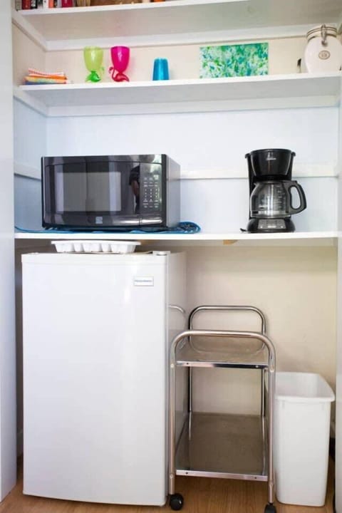 Small refrigerator, microwave and coffeemaker 