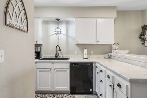 Unit 3’s airy, open kitchen offers ample space & every home comfort