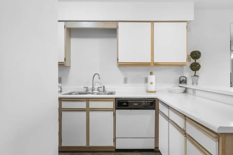 Ample counter space & homey amenities await in the open kitchen