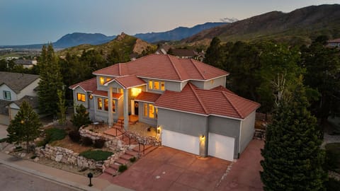 Stunning custom home in a beautiful neighborhood with mountain and city views