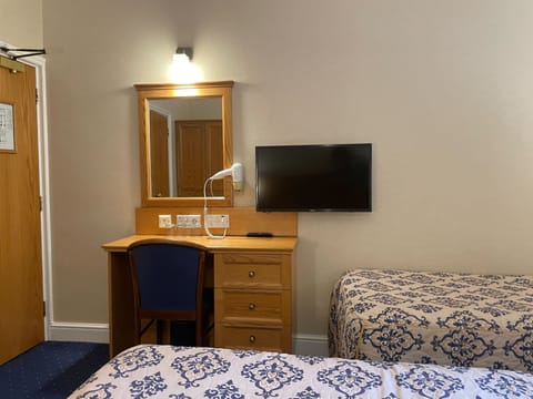 Standard Quadruple Room | Iron/ironing board, free WiFi, bed sheets