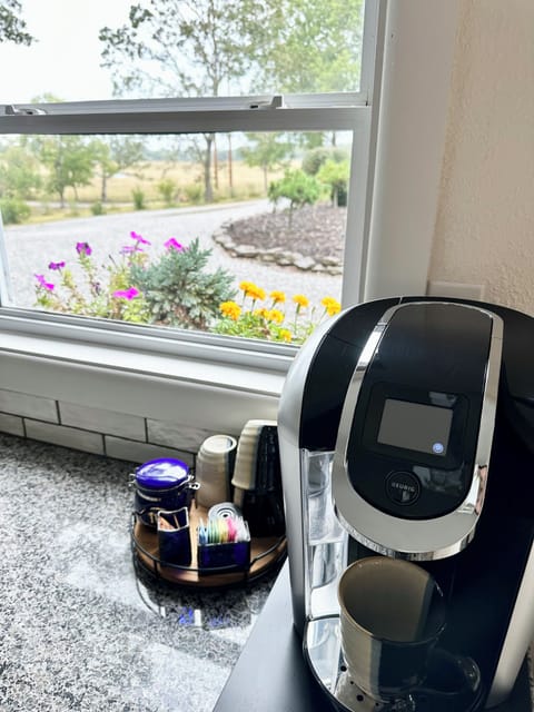 Keurig, coffee pods, creamers, varied sweeteners, and drip coffee all available.