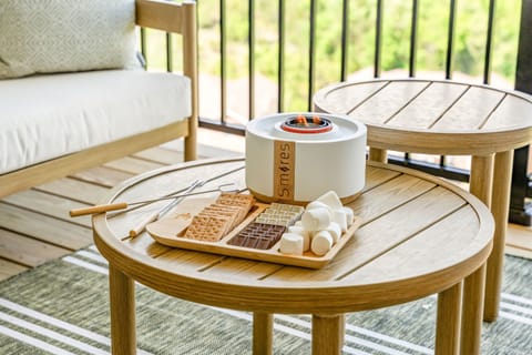 Make sweet memories with our cozy balcony s’mores setup—marshmallows, chocolate, and sunset views included!