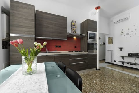 Apartment, Air conditioning, City View | Private kitchen | Espresso maker, coffee/tea maker, highchair
