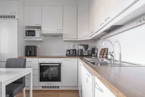 Comfort Apartment, City View | Private kitchen | Full-size fridge, microwave, oven, stovetop