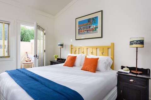 Patio King Guestroom | Desk, iron/ironing board, free WiFi, bed sheets