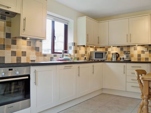 Kitchen/diner | Storrs Retreat, near Bowness on Windermere