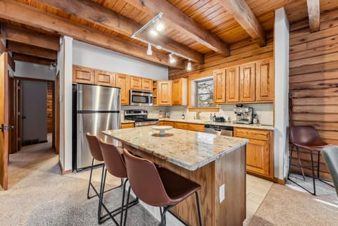 Kitchen: Drip coffee maker, espresso machine, air fryer, cooking utensils, tableware