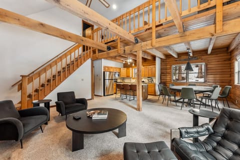 Living room: Gas fireplace, 45” Smart TV with Roku, radiant heat, no A/C, patio access