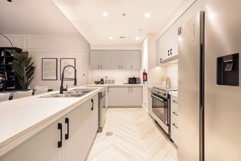 Modern kitchen fully stocked with essentials, ideal for cooking anything from a quick breakfast to a full dinner.