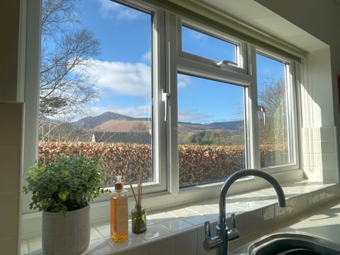 Enjoy the stunning views as you wash up!