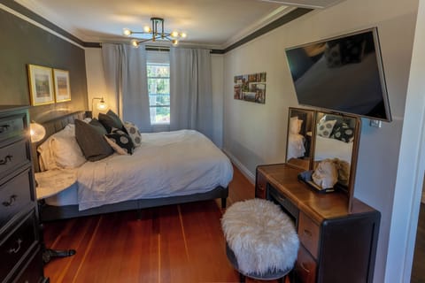 Main bedroom with king (sleeps 2) + twin sofa bed (sleeps 1).