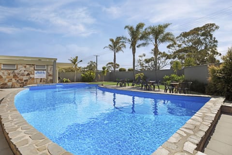 Outdoor pool, open 9:00 AM to 9:00 PM, sun loungers